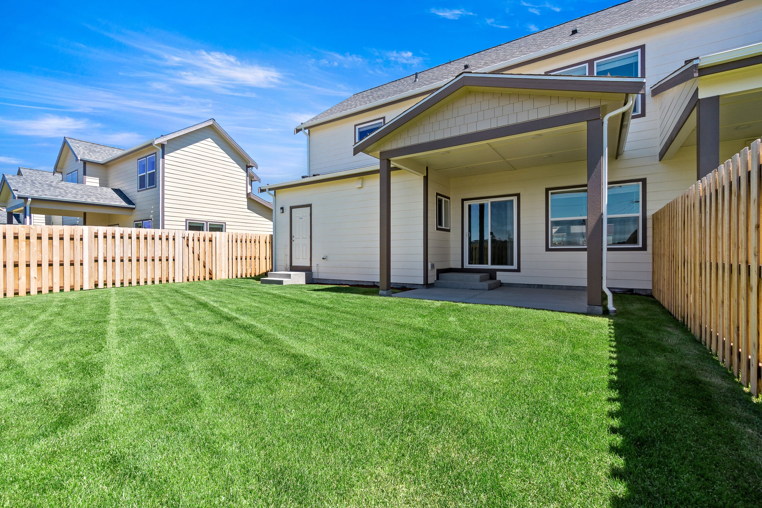 Backyard with fence and covered patio